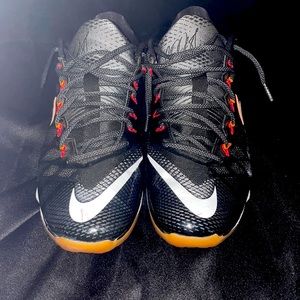 Exclusive black white and orange Nike flyweaves